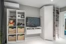 Мебель для детской: распашной шкаф для одежды и подвесная консоль для ТВ. Выполнены из ЛДСП Egger